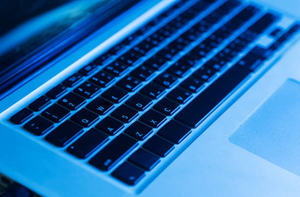 istock laptop keyboard close up ligt blue 1362920268