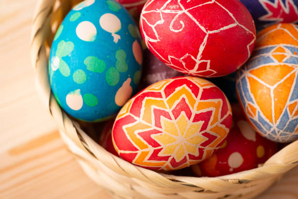 istock Close-up top-down photo of Easter eggs in basket on the table 1362921394