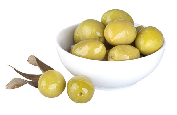 istock Large green olives isolated on a white background 1362922962