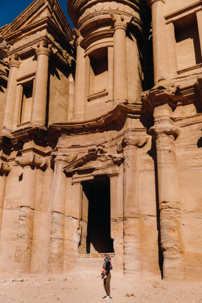istock Female backpacker exploring the ancient world of Petra in Jordan 1362923101