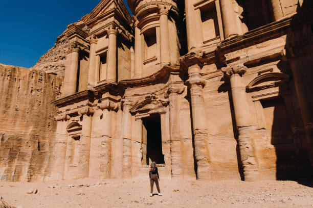 istock Female backpacker exploring the ancient world of Petra in Jordan 1362923165