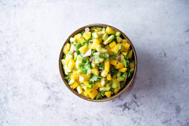 istock Mango Guacamole with corn chips and ingredients to prepare it 1362923586