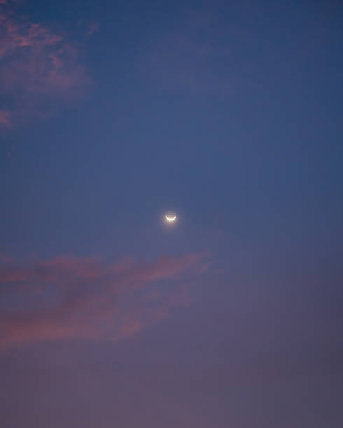 istock Crescent moon glowing in the sky 1362924414