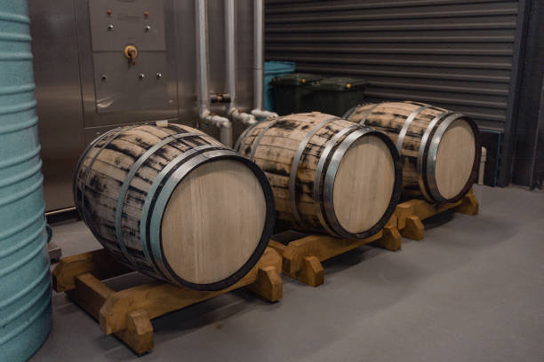 istock old oak wood barrels with beer in the underground cellar 1362927098
