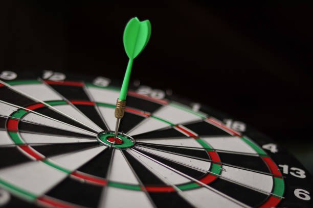 istock Dart arrow hitting in the target center. 1362927677