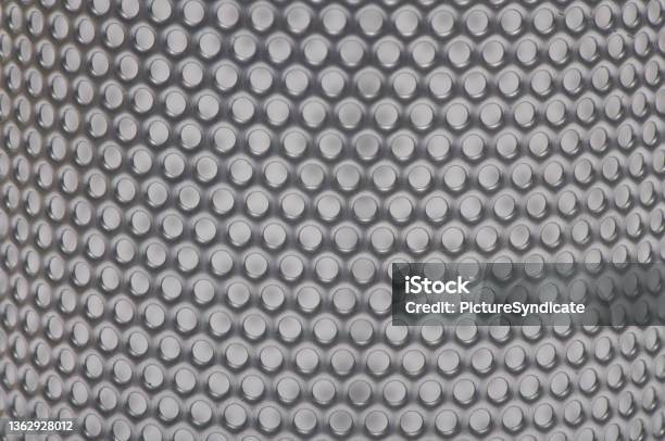Macro Round Curved Metal Perforated Sheet Background Stock Photo - Download Image Now