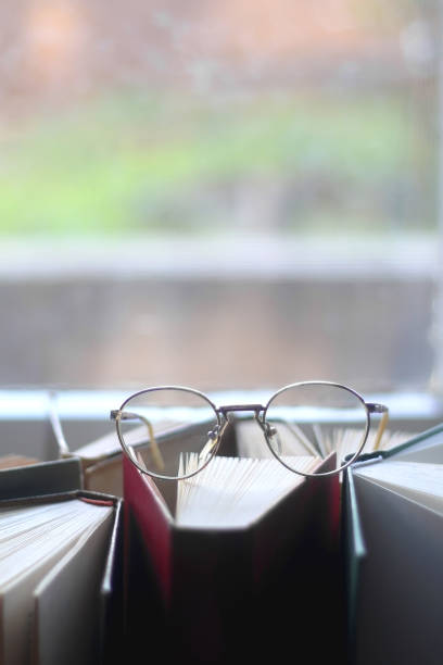 istock Hardcover Books and Reading Glasses 1362928047