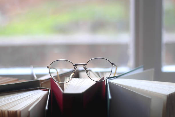 istock Hardcover Books and Reading Glasses 1362928063