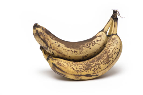 istock overripe brown ripe bananas against white background 1362928077