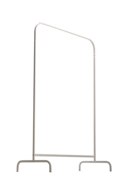 istock Garment clothing rack for clothes hangers isolated on white background.. 1362933175