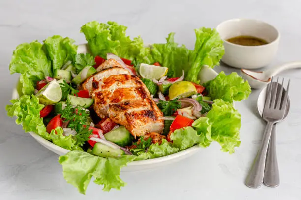 Grilled Chicken Salad on White Background