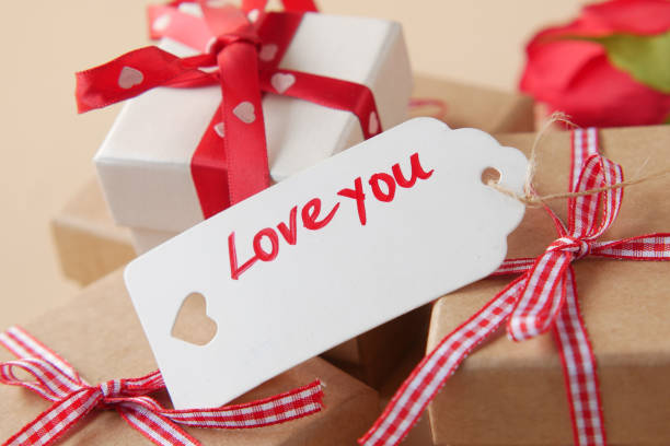 istock love you text on a paper with gift box on table 1362936692