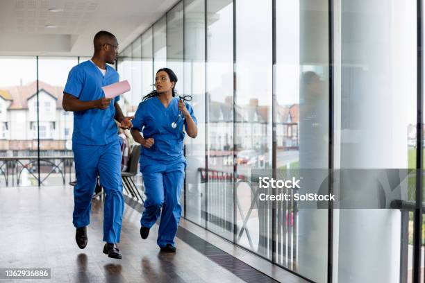 Doctors Running To Help Stock Photo - Download Image Now - Nurse, Healthcare And Medicine, Running