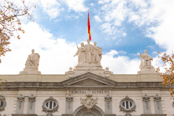 Detail of the main facade of the Supreme Court building in Madrid, Spain. Madrid, Spain - December 19, 2021: Detail of the main facade of the Supreme Court building in Madrid, Spain. the flag of the madrid spain stock pictures, royalty-free photos & images