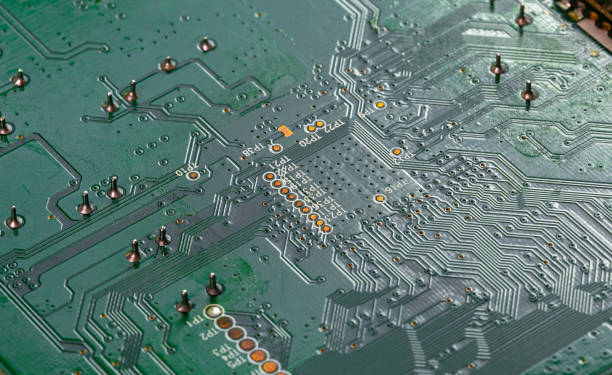 istock Macro Close up of printed wiring on PC circuit board 1362944256
