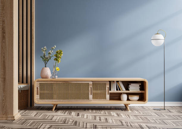 istock Cabinet for tv in modern empty room with behind the dark blue wall. 1362944347