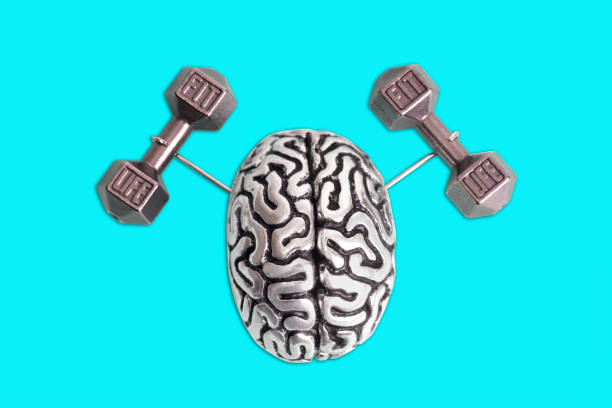 istock Human brain lifting dumbbells on blue background 1362947793