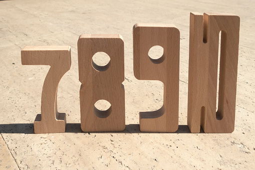 wooden numbers and shadows