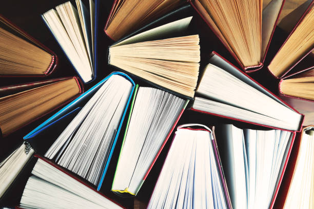 istock Stack of hardcover books as background, top view 1362949161