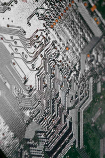 istock Macro Close up of printed wiring on PC circuit board 1362949394