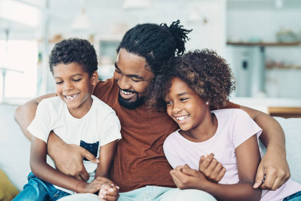 istock Happy father with two children 1362951614