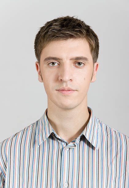 istock young cute guy looks at you 136295446