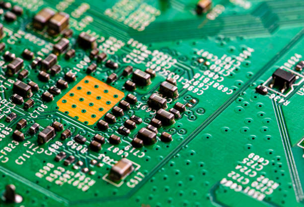 istock Macro Close up of printed wiring on PC circuit board 1362954974
