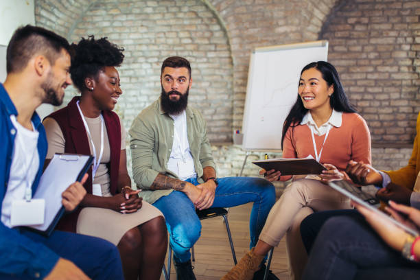 istock Happy  business team at corporate training, team building activity, diverse employees group. 1362955716