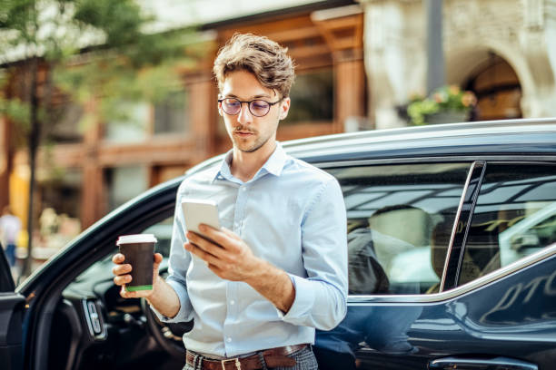 istock Man driving his car 1362963240