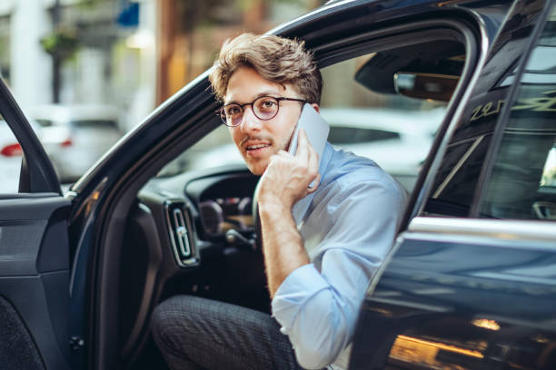 istock Man driving his car 1362963256