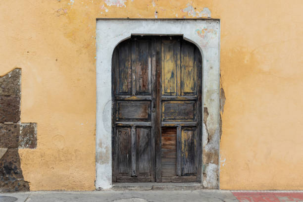 istock Old colonial door in antigua guatemala , colonial style architecture 1362964471