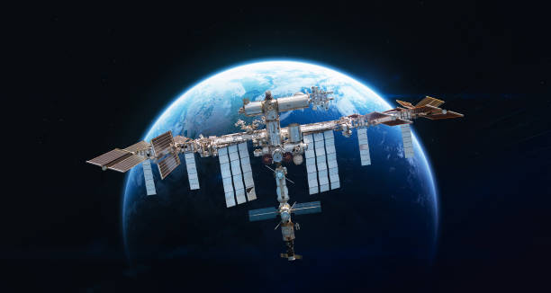 ISS space station in dark space against Earth planet sphere. Space sci-fi collage with satellite and planet. Elements of this image furnished by NASA ISS space station in dark space against Earth planet sphere. Space sci-fi collage with satellite and planet. Elements of this image furnished by NASA (url:https://earthobservatory.nasa.gov/blogs/elegantfigures/wp-content/uploads/sites/4/2011/10/land_shallow_topo_2011_8192.jpg) international space station stock pictures, royalty-free photos & images