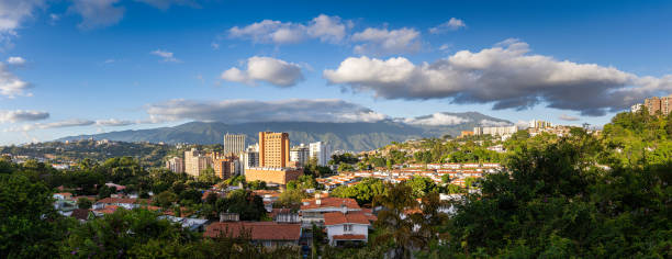 Panoramic view of Caracas city at sunset from Cota Mil. stock photo