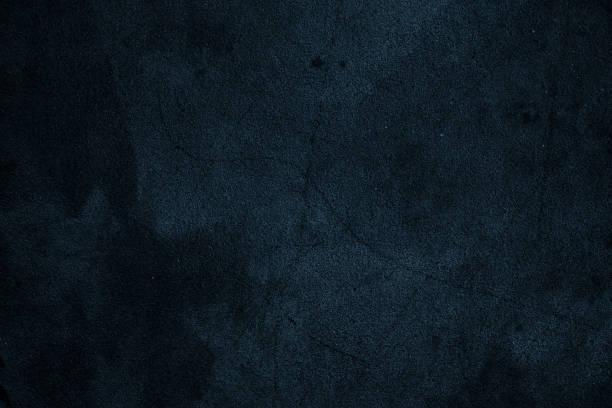 istock Abstract dark blue grunge texture with scratches and spots on an old cement plaster wall for background 1362971544