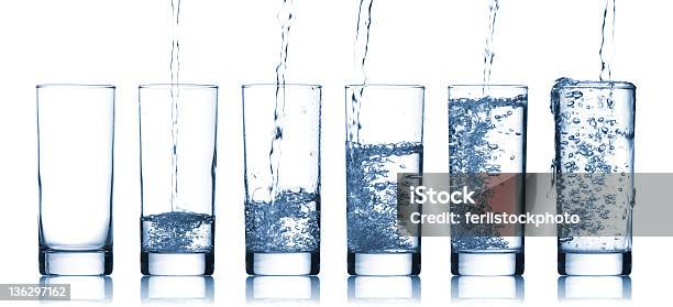 Gradually Larger Glasses Of Pure Water Stock Photo - Download Image Now - Bubble, Clean, Cold Drink