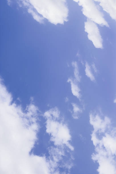 istock sky with clouds. background of lilac sky with white clouds. Very Pure 1362971637