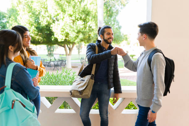 istock Diverse friends coming back to school 1362971907