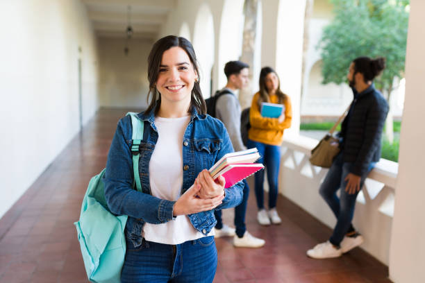 istock Gorgeous woman going to the library 1362972707