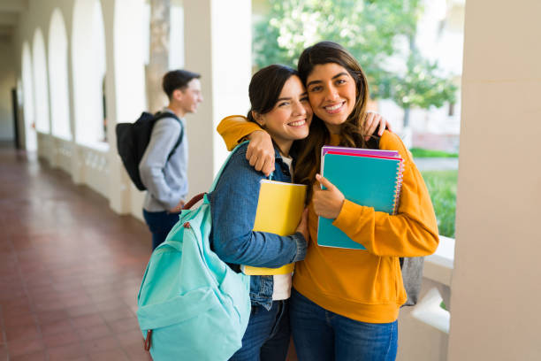 istock Female university students embracing 1362972841