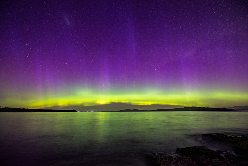The Southern Lights, or Aurora Australis, put on a particularly dazzling display in November 2021. The beams were very high, and there was a great deal of movement. This image was captured at South Arm with Bruny Island on the horizon.