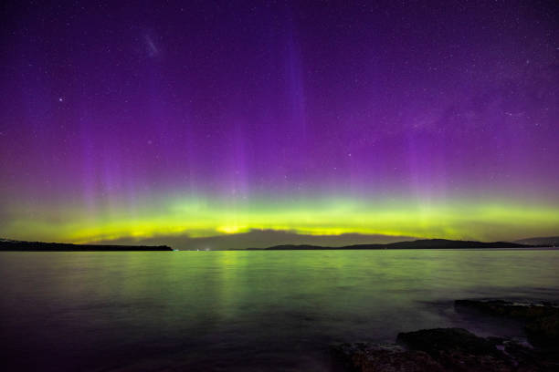 the southern lights, or aurora australis appears in the skies over tasmania, australia on november 4, 2021 - australis imagens e fotografias de stock
