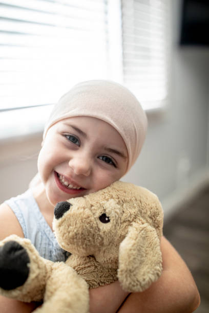 istock Cancer Patient and her Stuffed Animal 1362976377