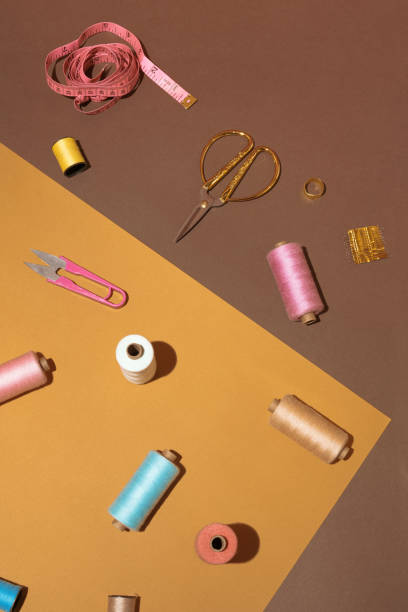 istock Creative sewing concept with threads, needles, scissors and measuring tape.DIY background idea.Personal inventiveness. 1362977771