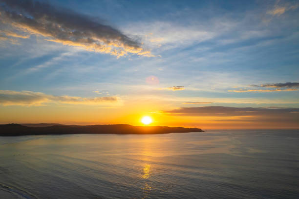istock Sunrise seascape with a mix of high and medium clouds 1362980423