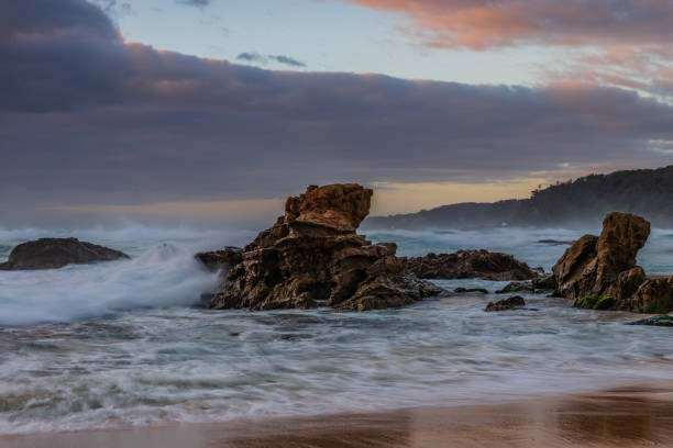 istock Rocks and waves - sunrise seascape at Bermagui 1362980589
