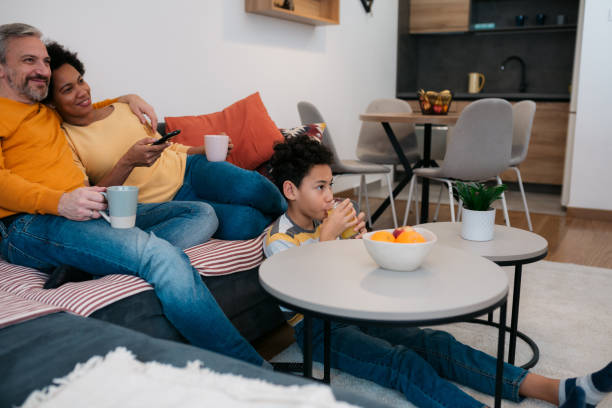 istock Happy diverse family bonding at home 1362980730