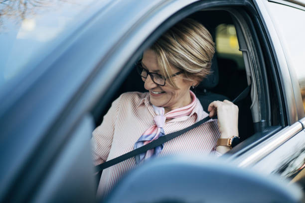 istock Mature woman in a car. 1362981538