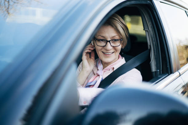 istock Mature woman in a car. 1362981562