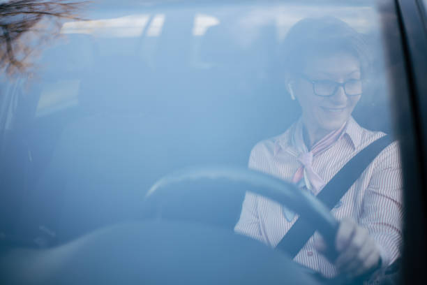istock Mature woman in a car. 1362981567