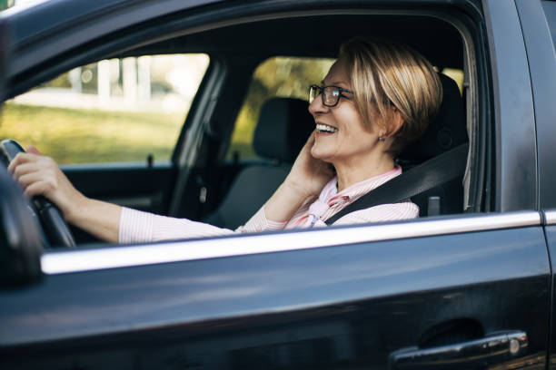 istock Mature woman in a car. 1362981591